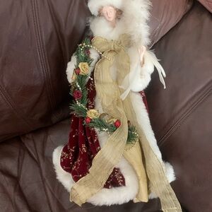 Elegant Holiday Santa Figurine with Gold and Red Accents